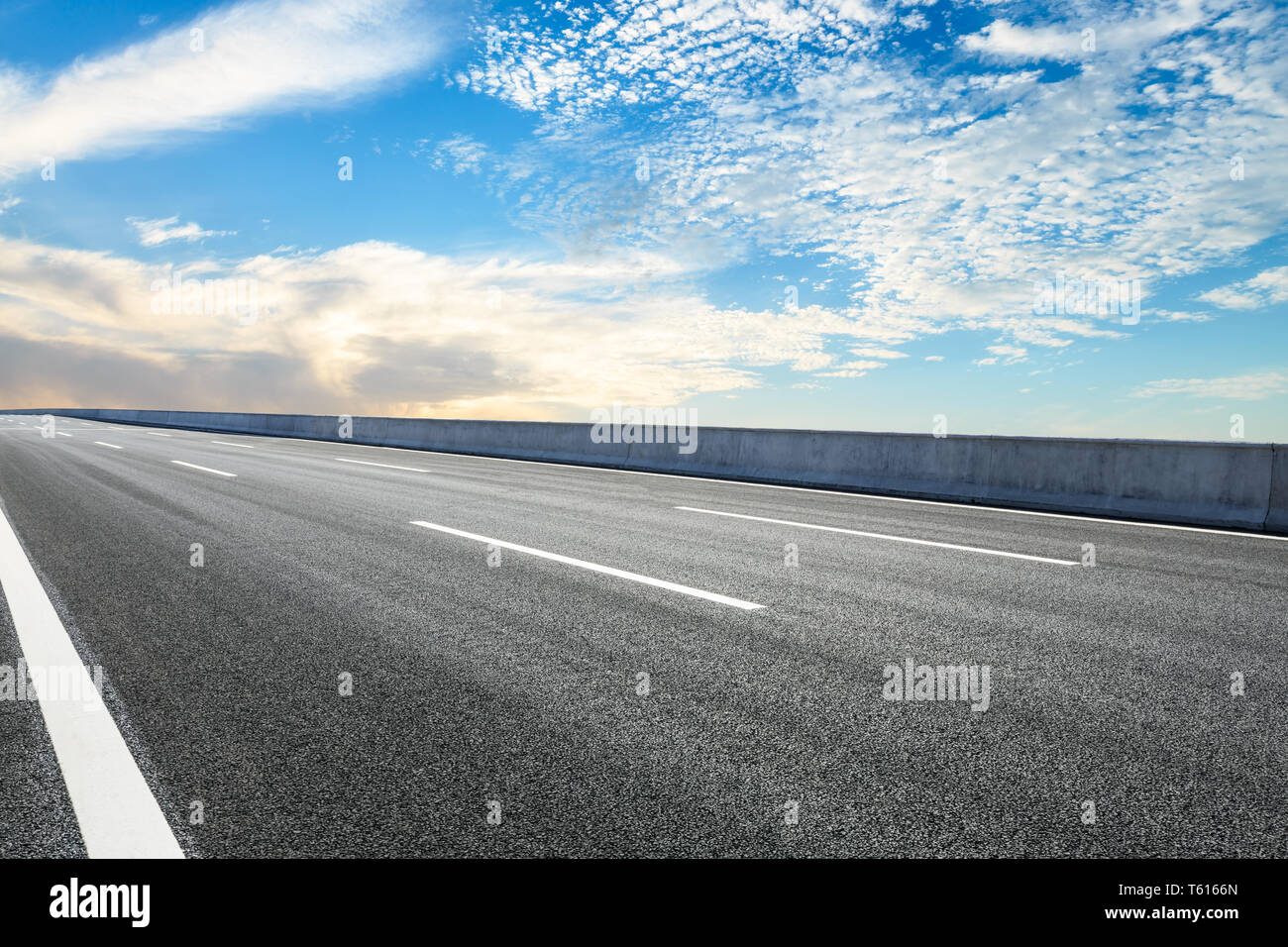 Empty asphalt road ground and blue sky with white clouds scene Stock ...