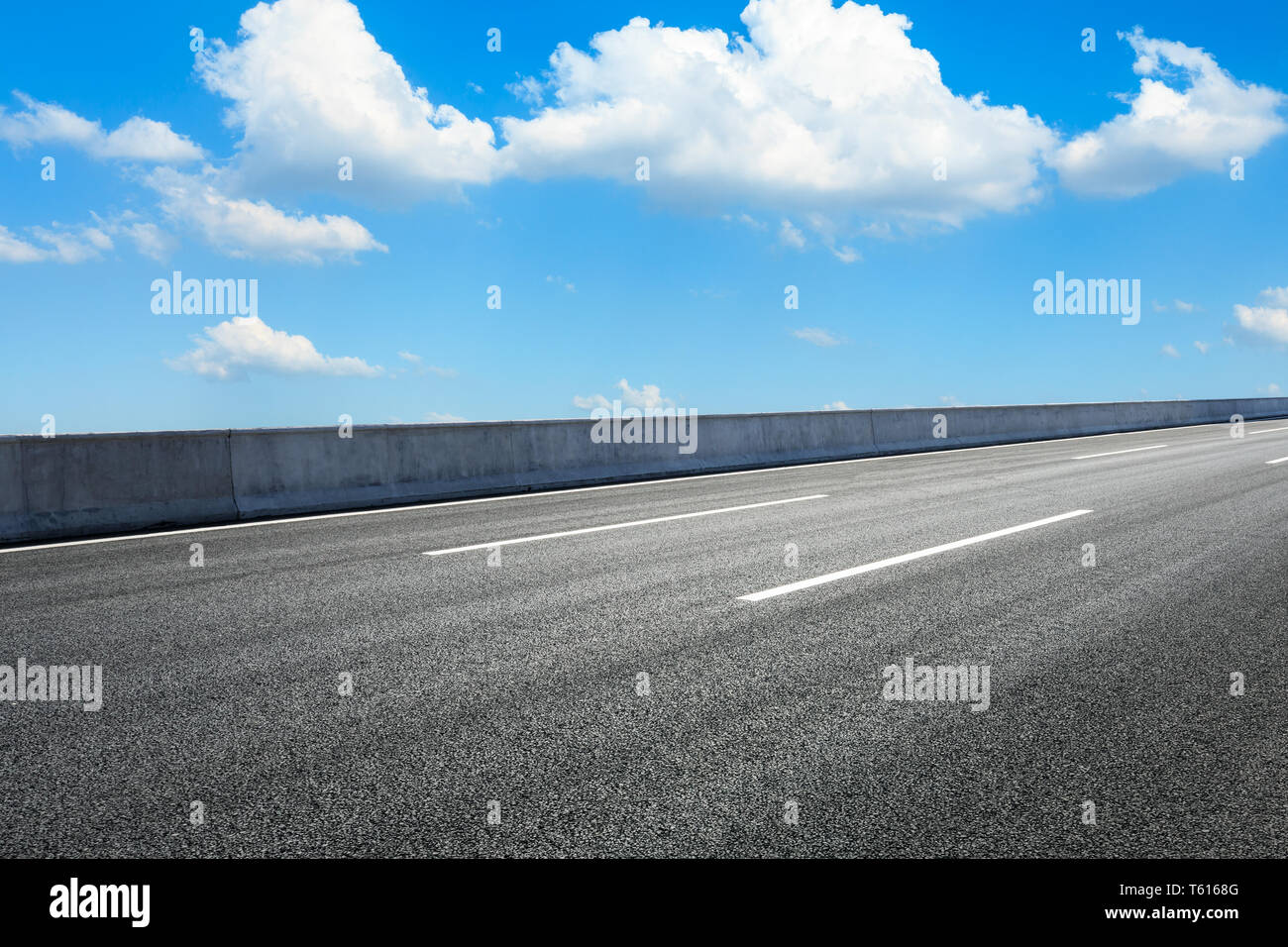 Empty asphalt road ground and blue sky with white clouds scene Stock ...