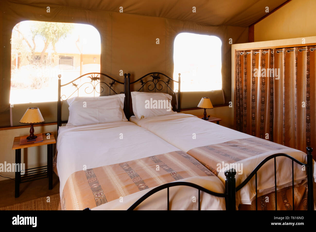 Tourist accomodation: Tent in Desert Camp near Sesriem, interior with bed, Maltahöhe District, Hardap Region, Namibia Stock Photo