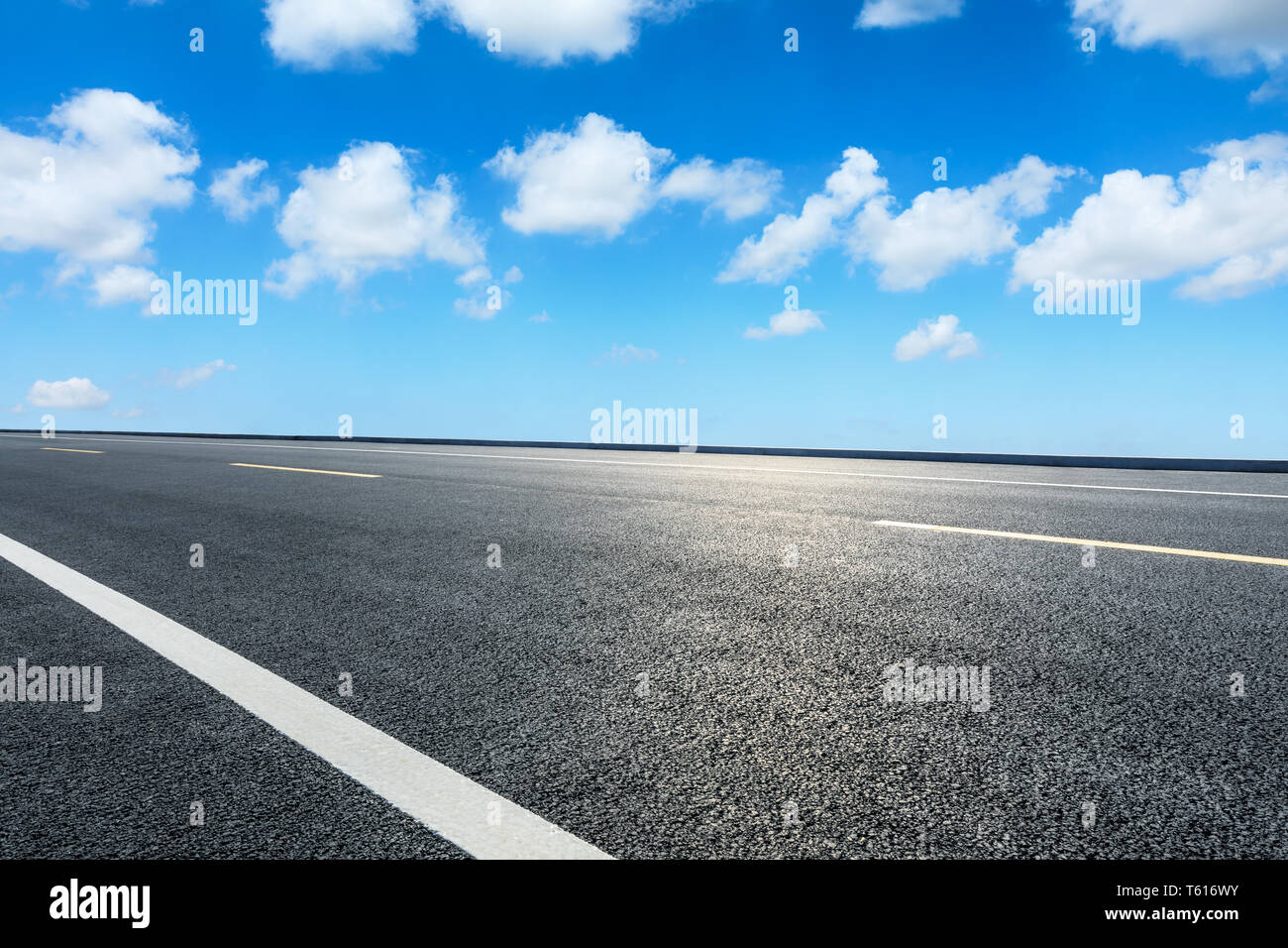 Empty asphalt road ground and blue sky with white clouds scene Stock ...