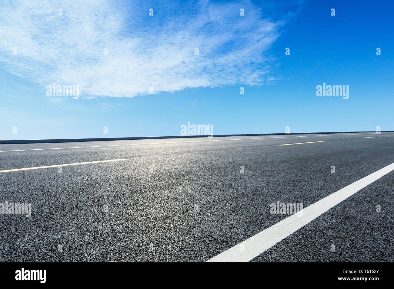 Empty asphalt road ground and blue sky with white clouds scene Stock ...