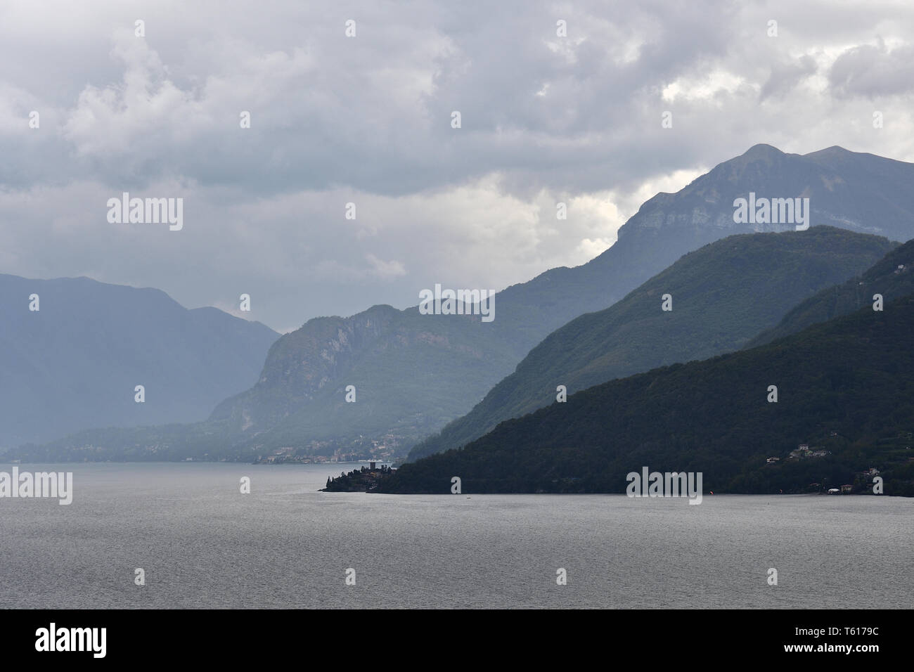 View of Santa Maria Rezzonico from piona in cloudy day. Stock Photo