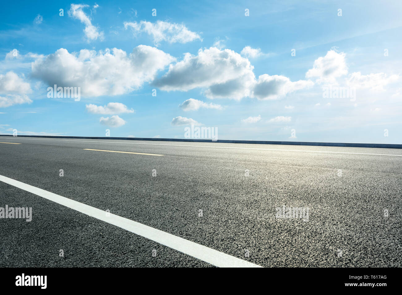 Empty asphalt road ground and blue sky with white clouds scene Stock ...