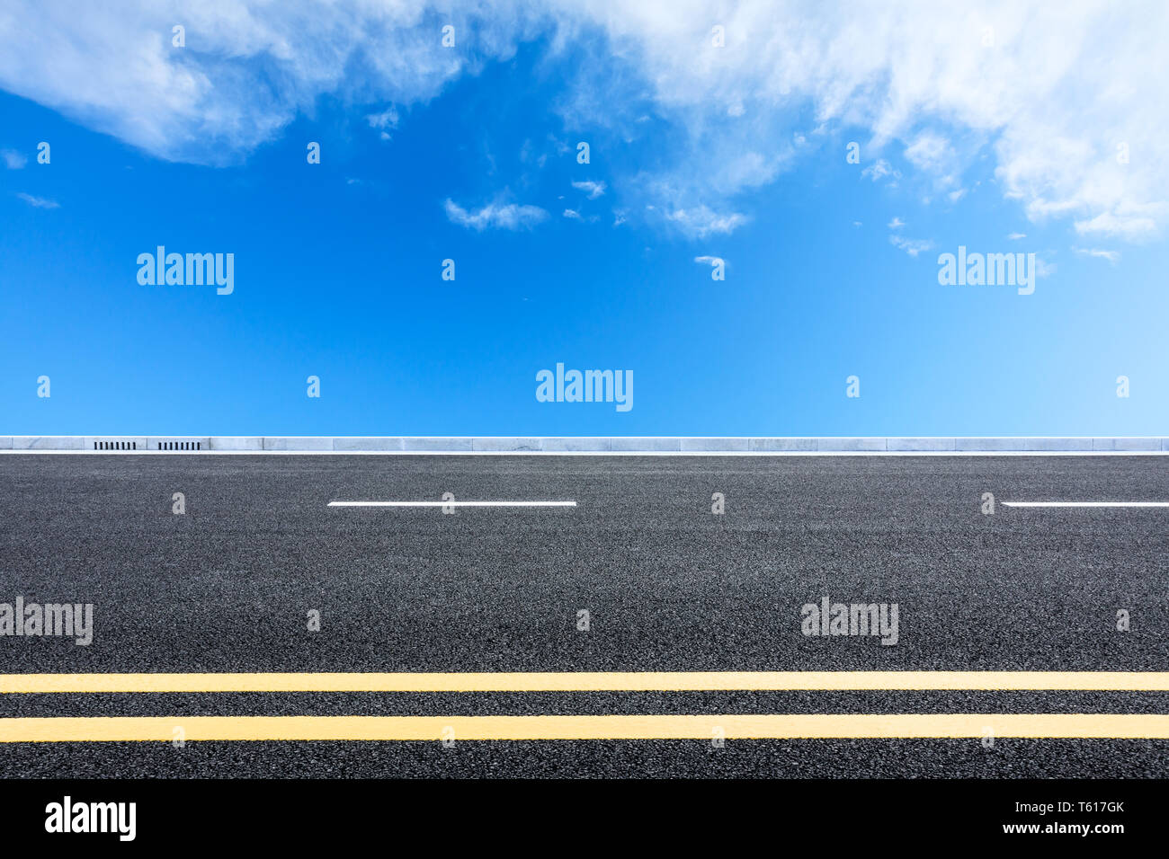 Empty asphalt road ground and blue sky with white clouds scene Stock ...