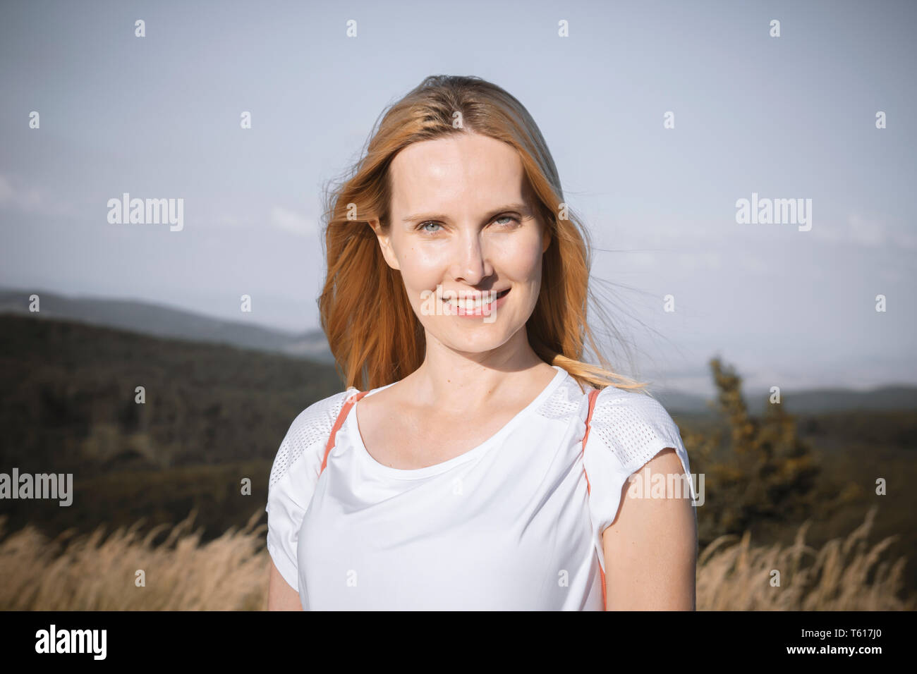 young pregnant woman posing in nature Stock Photo - Alamy