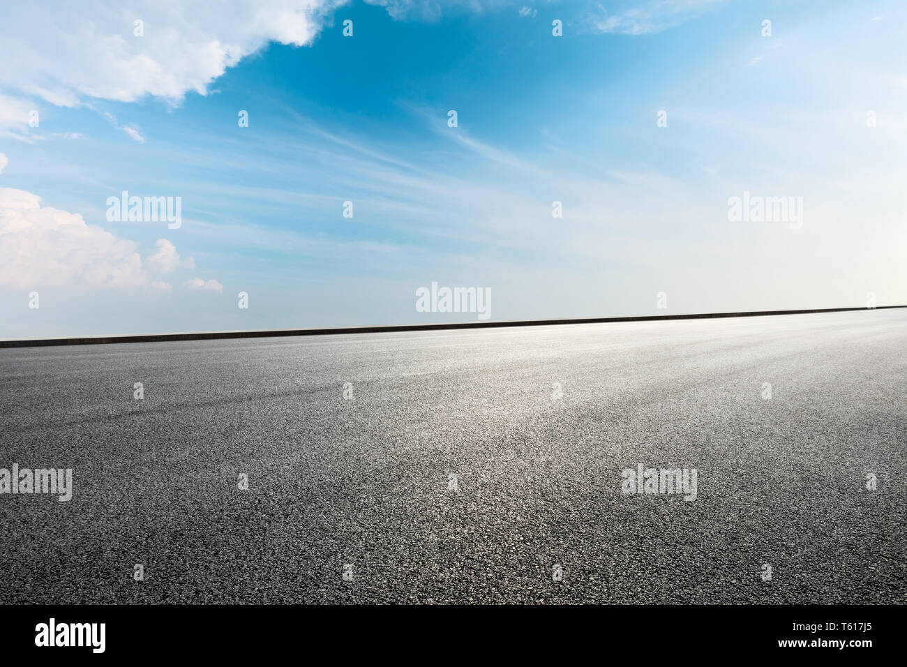Empty asphalt road ground and blue sky with white clouds scene Stock ...