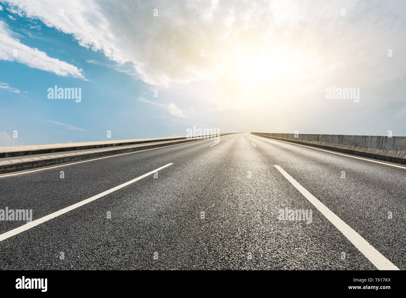Empty asphalt road ground and blue sky with white clouds scene Stock ...