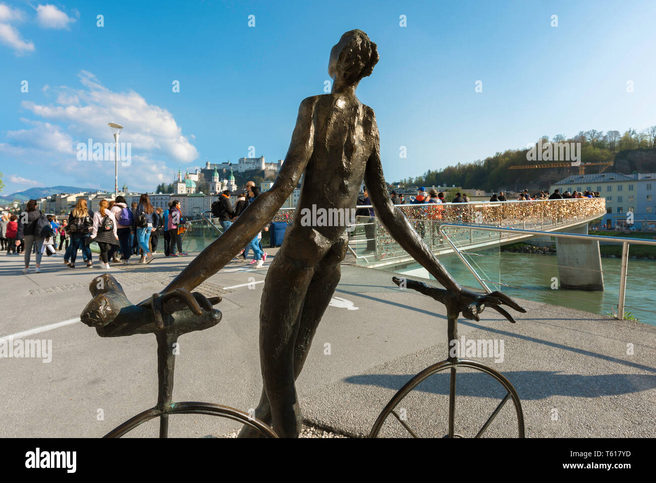 Cycling Salzburg, rear view of sculpture titled Cyclist (Radfahrer) sited beside the Elisabethkai cycle path in the city of Salzburg, Austria. Stock Photo