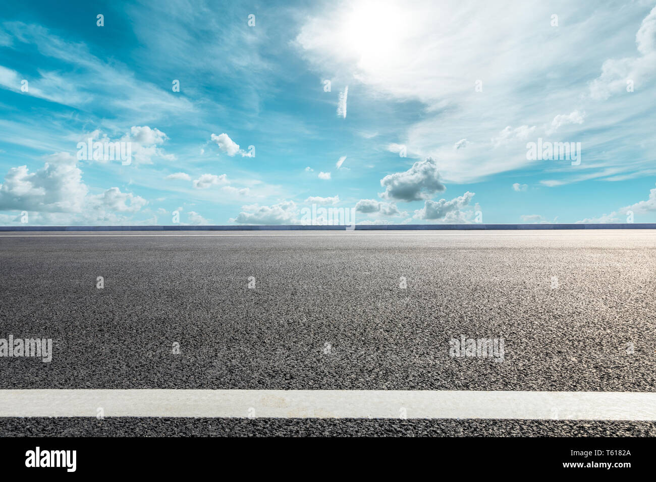Empty asphalt road ground and blue sky with white clouds scene Stock ...