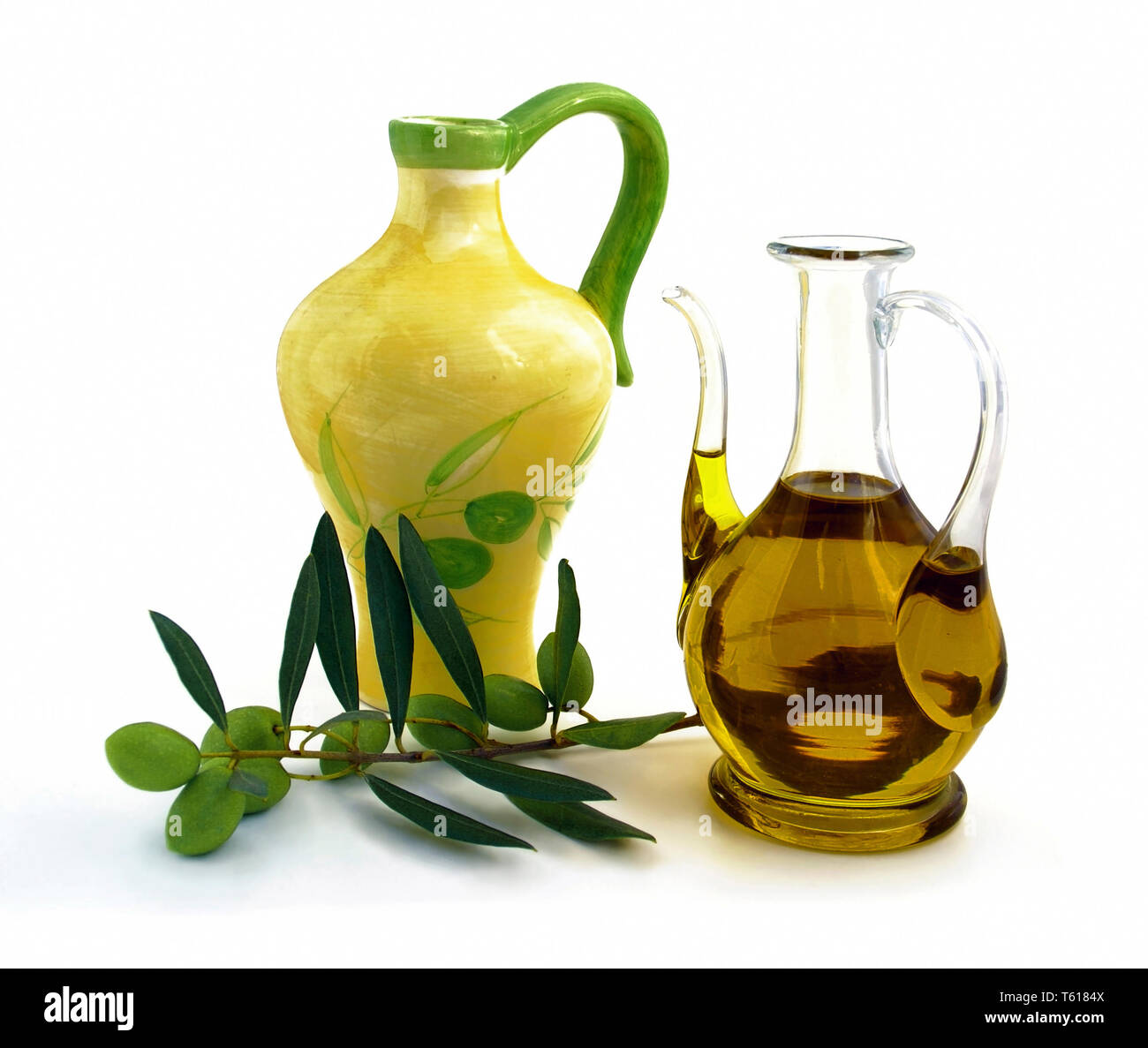 Jug of olive oil and pitcher. White background Stock Photo Alamy