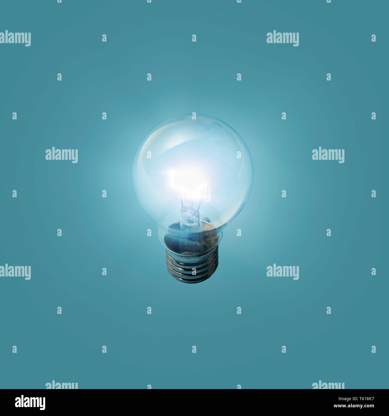 Lit incandescent lightbulb creativity, ideas and genius concept Stock