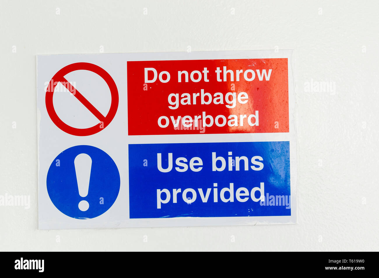 Signs warning passengers not to throw garbage overboard, to use the bins provided Stock Photo