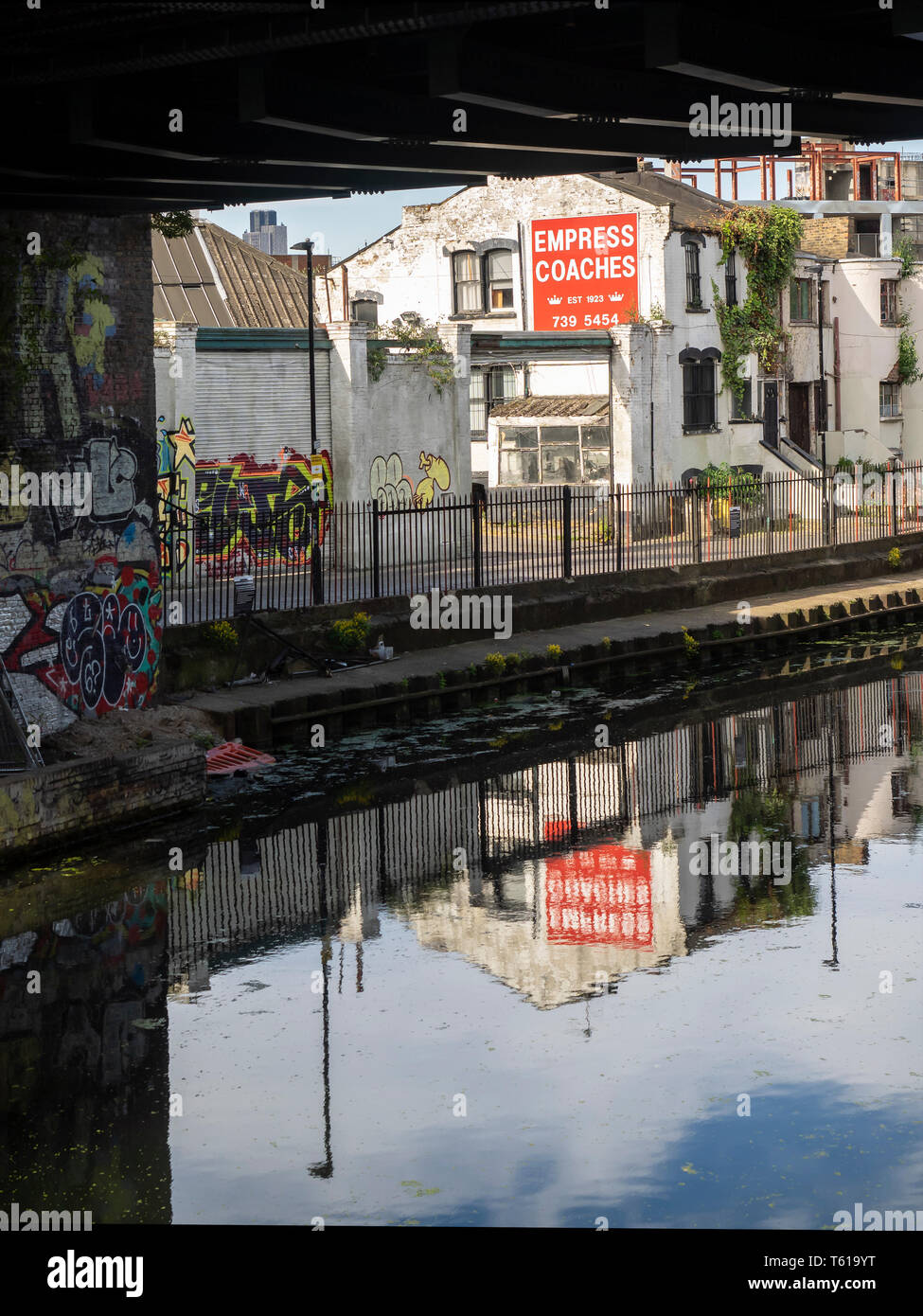 LONDON, UK - JUNE 14, 2018: View through Bridge across to canal side buildings on the Regent's canal Stock Photo