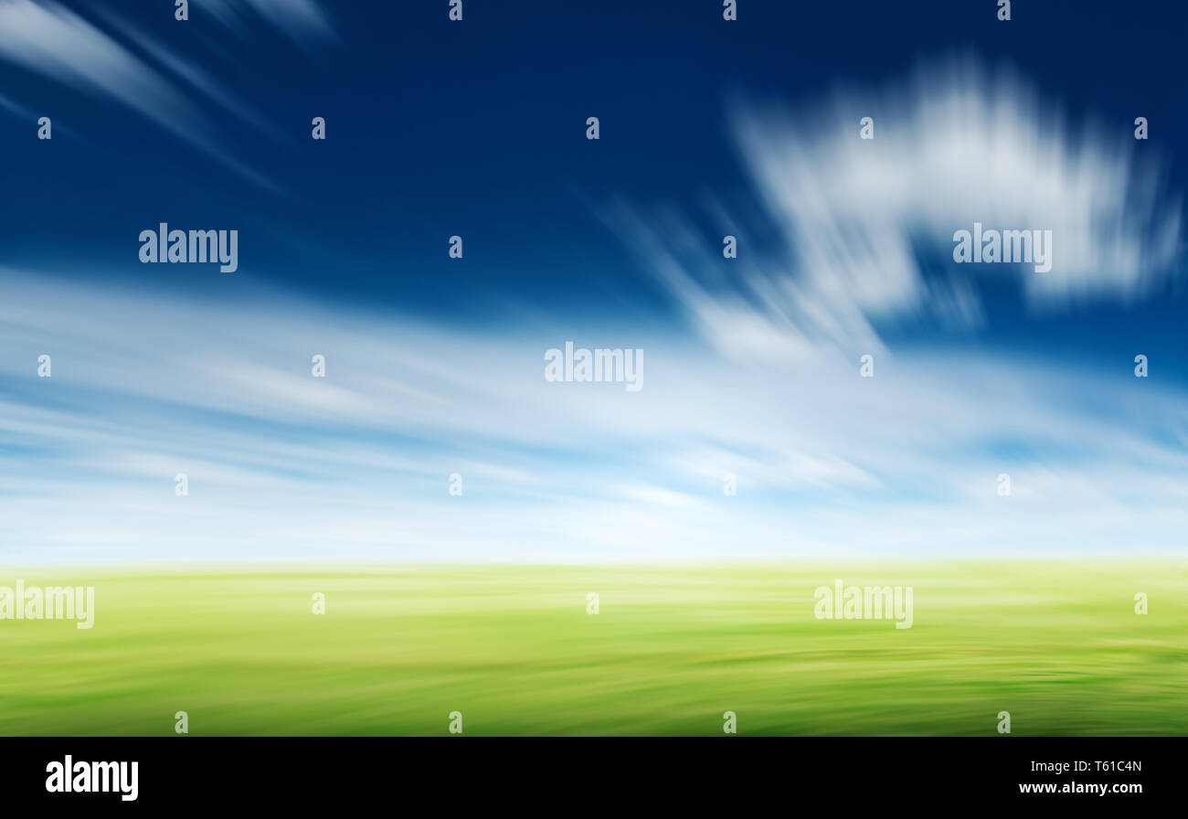 Grass and blue sky motion blur Stock Photo Alamy