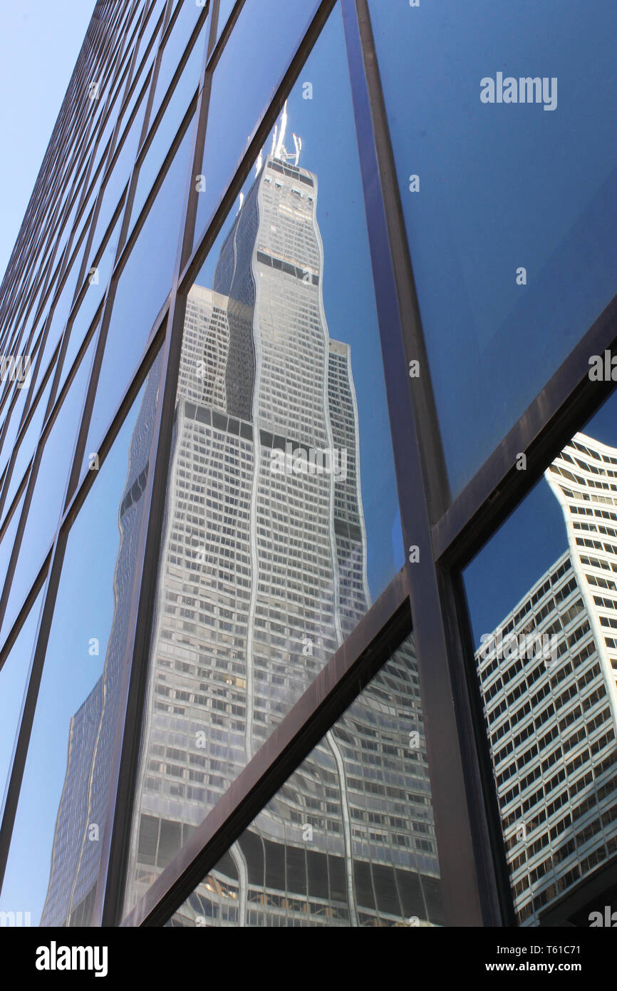 The Sears / Willis Tower reflecting in the windows of another building