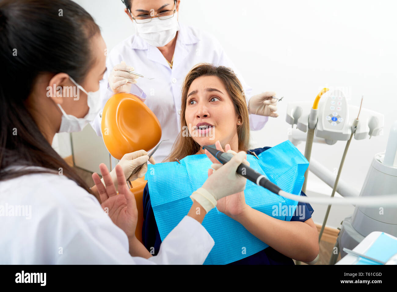 Panicking dentistry patient Stock Photo