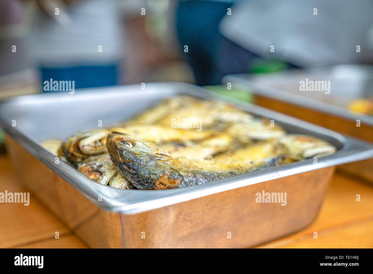 fried mackerel in plate, ready to eat with Nam Prik Kapi shrimp paste