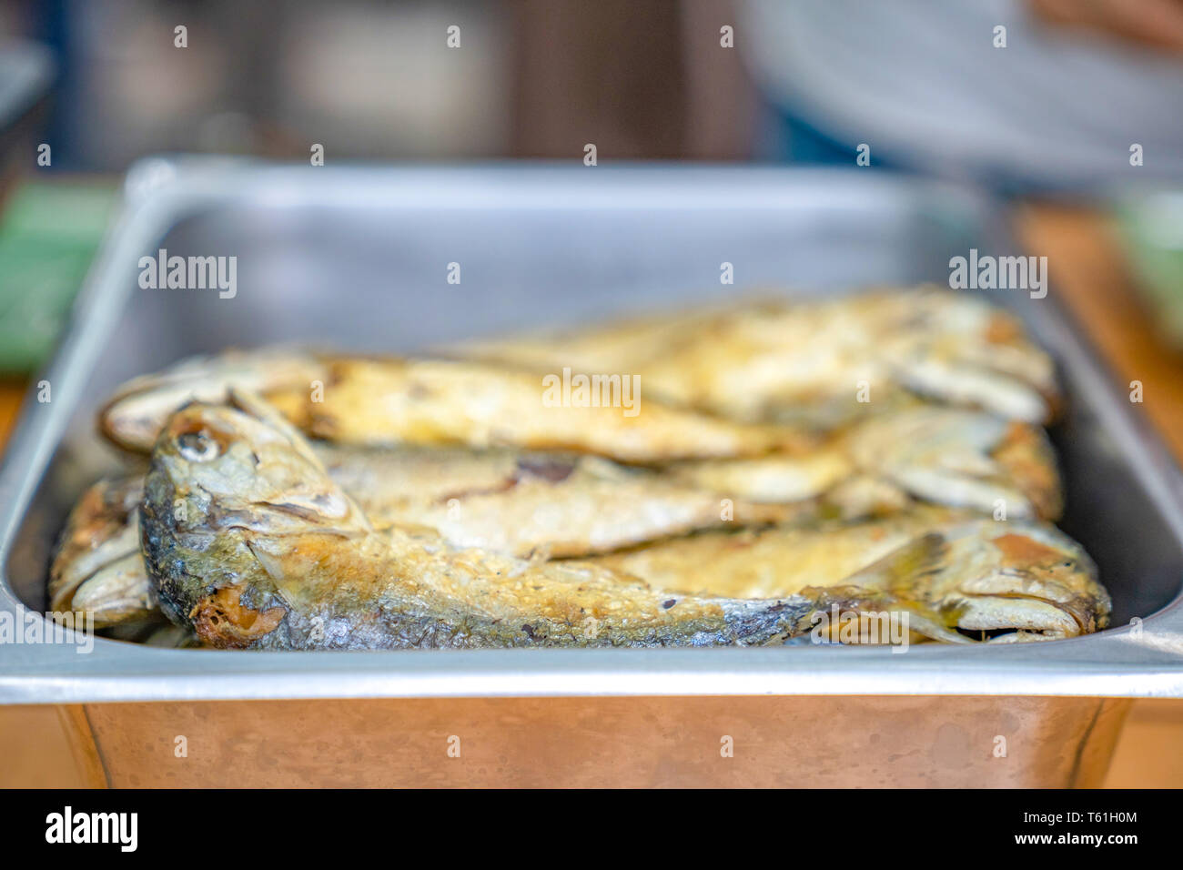 fried mackerel in plate, ready to eat with Nam Prik Kapi shrimp paste