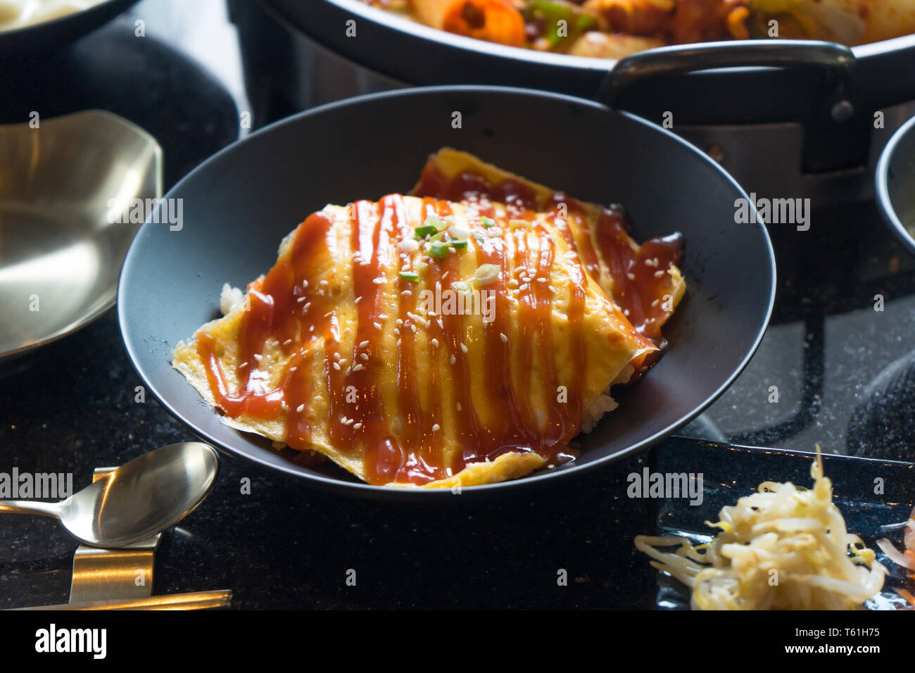 Omelet And Scrambled Egg With Tomato Ketchup Sauce And Onion On Top Stock Photo Alamy