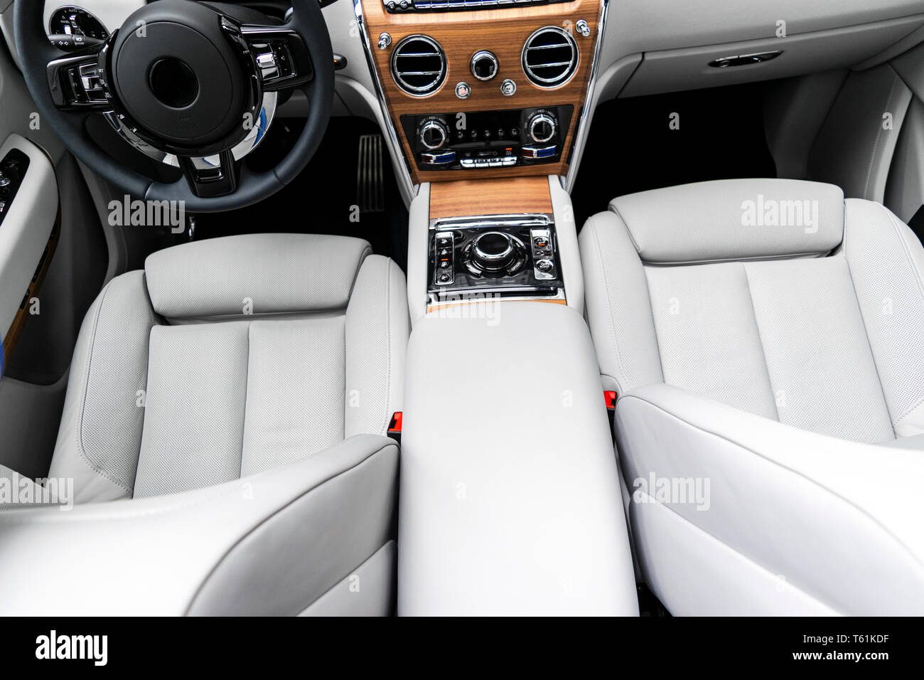 Modern luxury car white leather interior with natural wood panel. Part