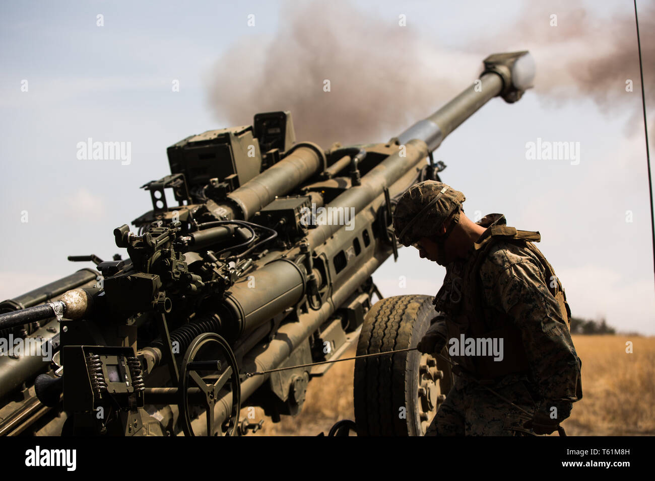 U.S. Marines with 3rd Battalion, 12th Marine Regiment, 3rd Marine Division, fire an M777 Howitzer during the Artillery Relocation Training Program 19-1 at the Combined Arms Training Center, Camp Fuji, April 20, 2019. ARTP provides 3rd Battalion, 12th Marine Regiment with essential, live fire training outside of Okinawa to increase their warfighting capabilities and support the U.S. - Japan Treaty of Mutual Cooperation and Security. (U.S. Marine Corps photo by Cpl. Josue Marquez) Stock Photo