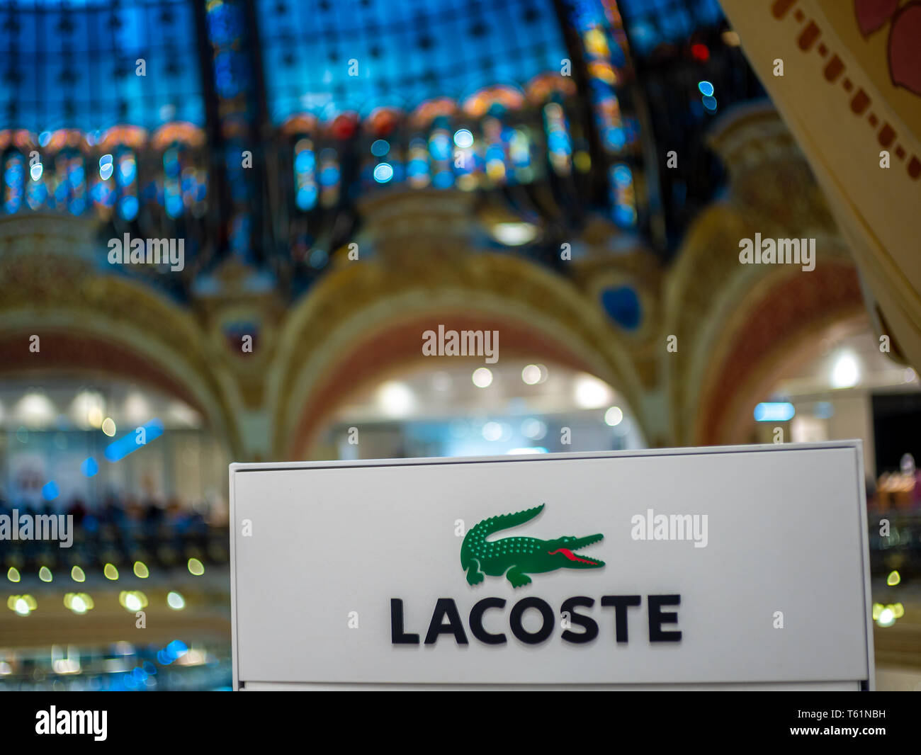 Paris, France, August 18,2018: Lacoste logo on display in Galeries  Lafayette Stock Photo - Alamy