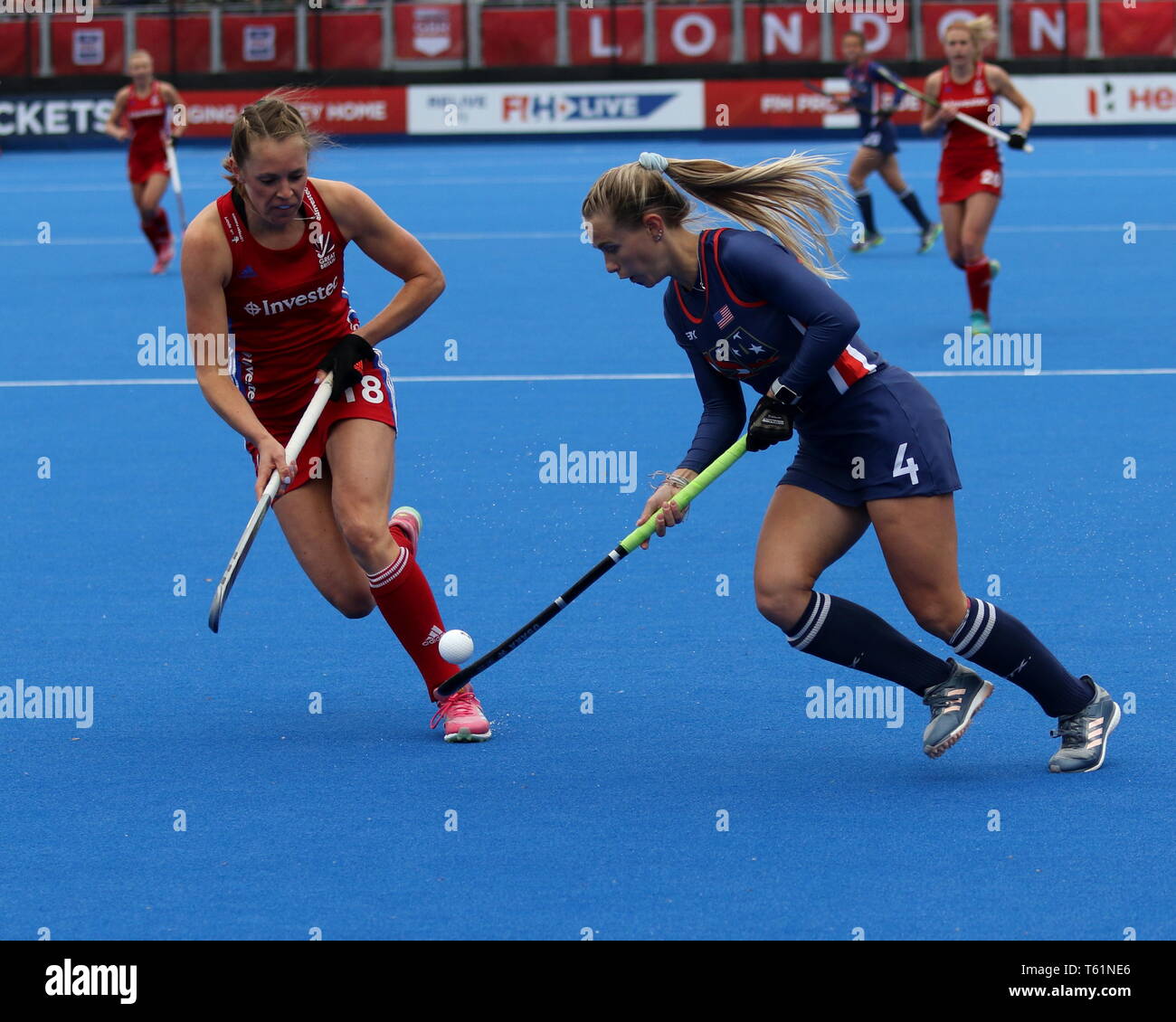 Giselle Ansley (GBR) attacking Danielle Grega (USA) in the 2019 FIH Pro League Great Britain v United States women’s hockey match at the Olympic Park Stock Photo