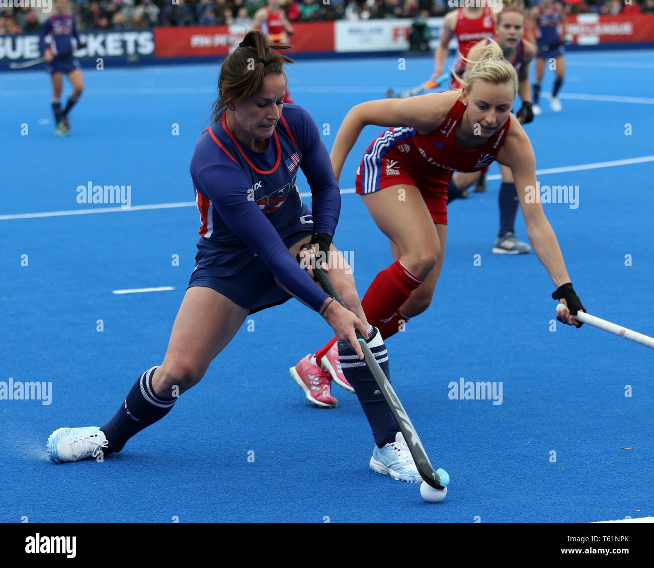 Hannah Martin (GBR) and Ali Froede (USA) in the 2019 FIH Pro League Great Britain v United States women’s hockey match at the Olympic Park, London Stock Photo