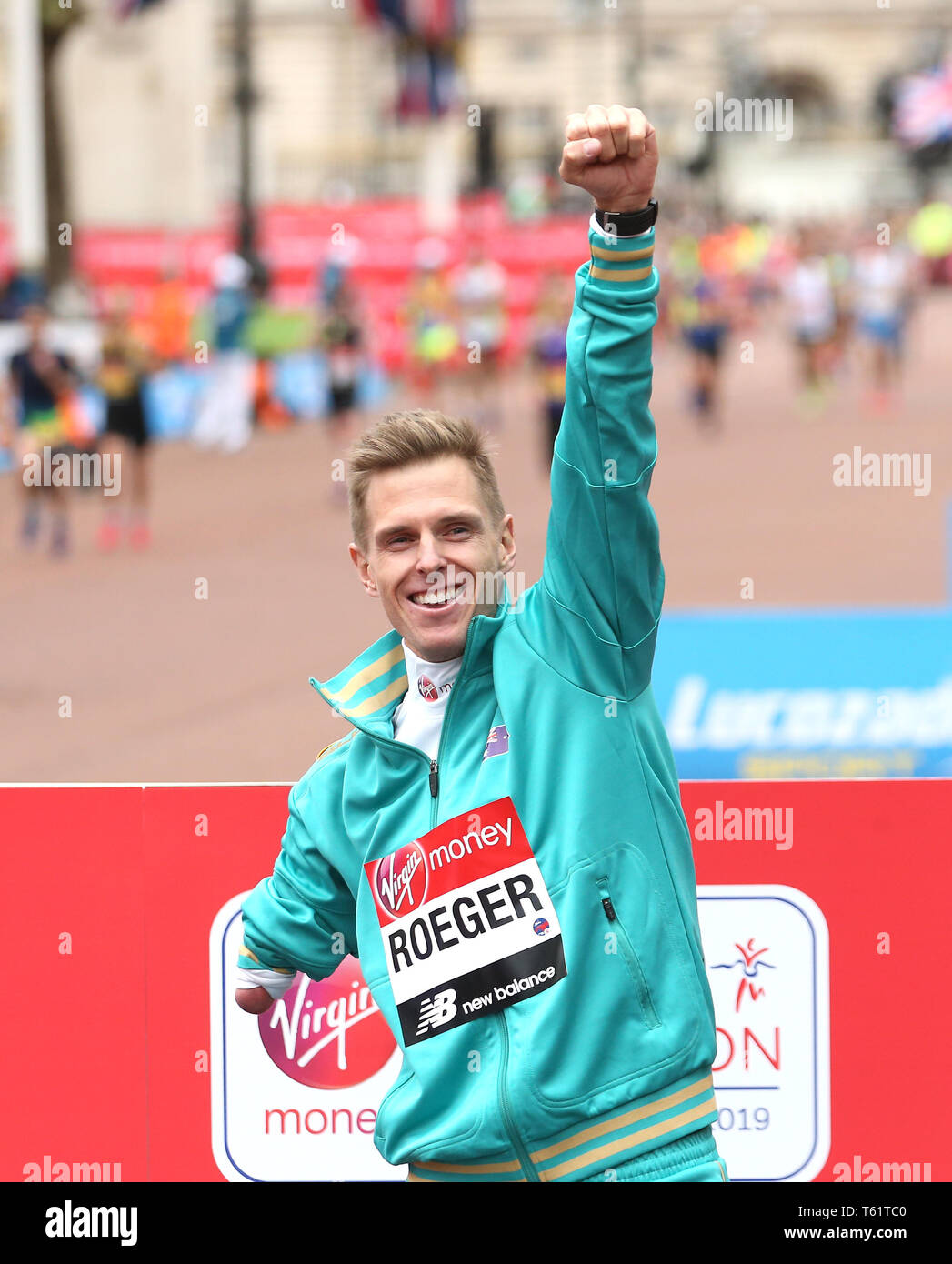 Australia's Michael Roeger celebrate with his medal after finishing ...