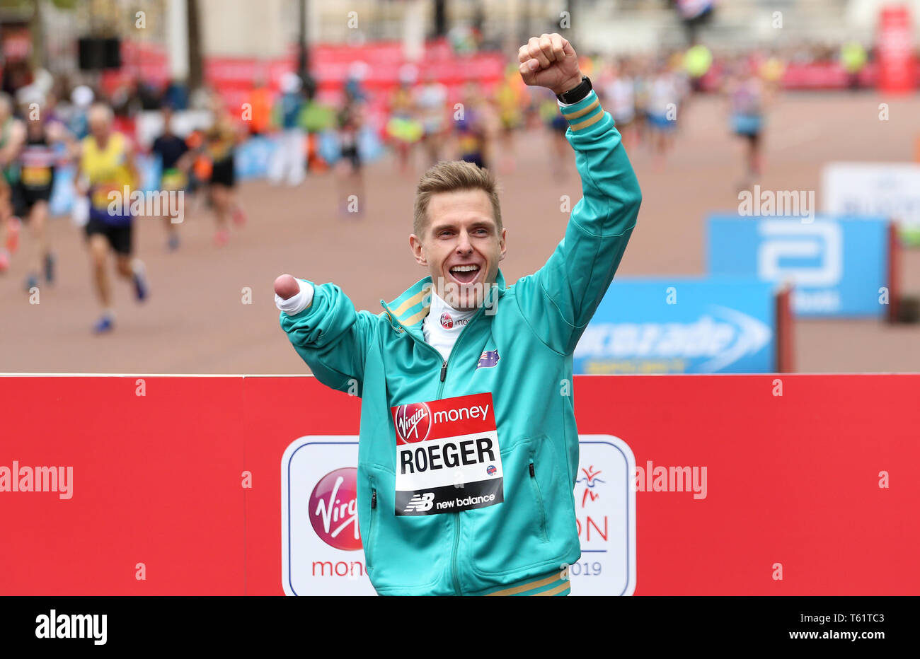 Australia's Michael Roeger celebrate with his medal after finishing ...
