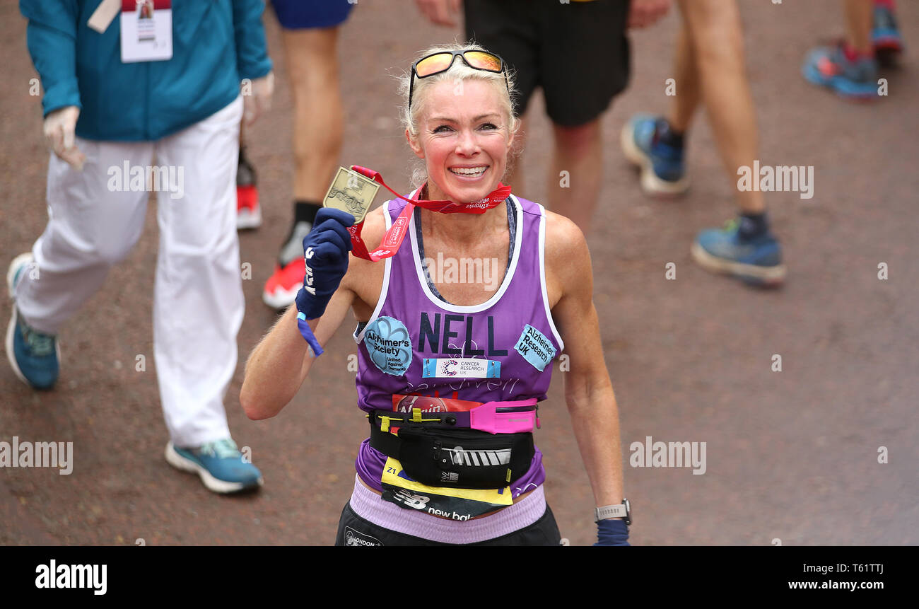 Nell McAndrew Poses With Her Medal After Crossing The Line During The nell-mcandrew-poses-with-her-medal-after-crossing-the-line-during-the