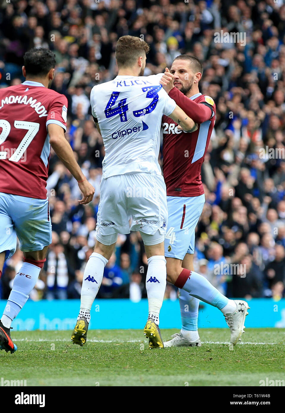 Leeds United's Mateusz Klich is confronted by Aston Villa's Conor Hourihane  after he scores his sides first goal whilst Aston Villa's Jonathan Kodjia  was down injured during the Sky Bet Championship match