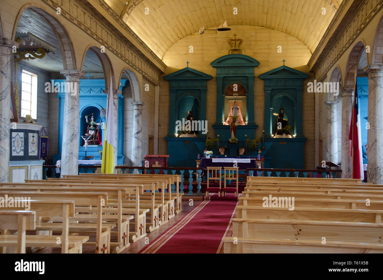 The well-tended interior of Necron's wooden church on Chiloé island, Chile Stock Photo