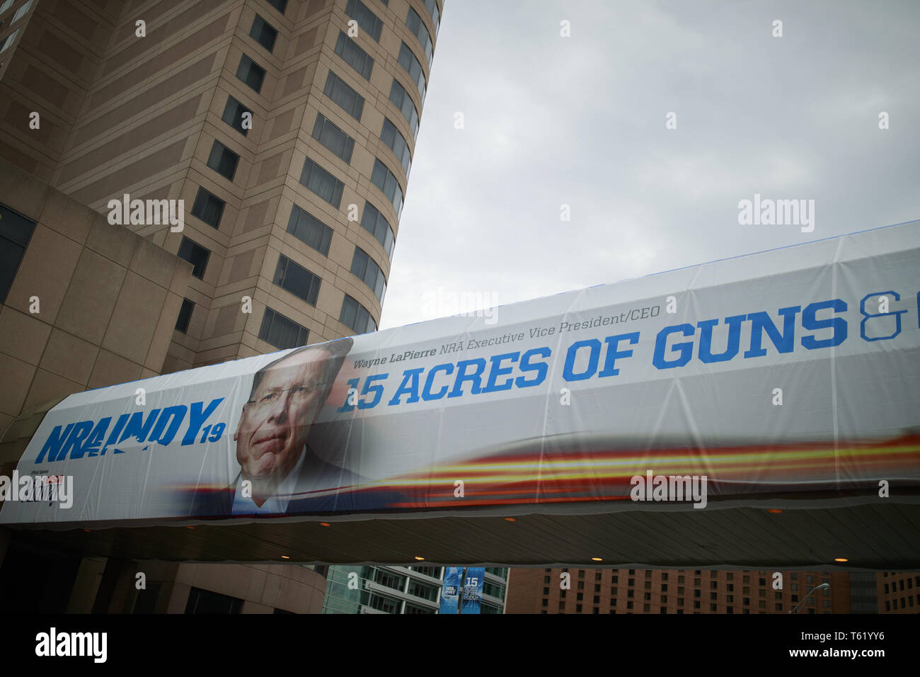Indianapolis, Indiana, UK. 27th Apr, 2019. A photo of NRA Chief Executive and Executive Vice President Wayne LaPierre is displayed on the Indiana Convention Center during the third day of the National Rifle Association convention. Credit: Jeremy Hogan/SOPA Images/ZUMA Wire/Alamy Live News Stock Photo