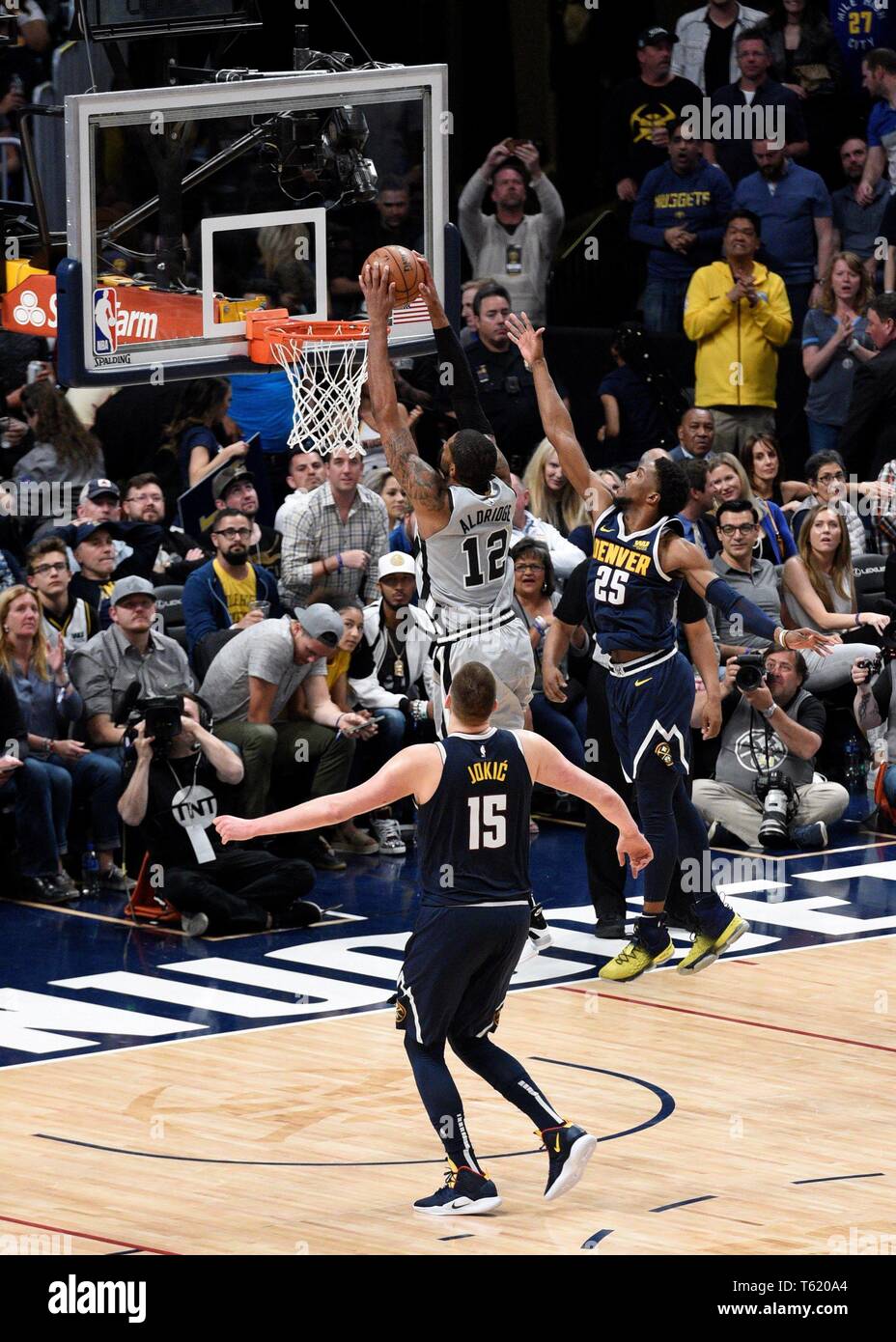 Denver United States 28th Apr 2019 San Antonio Spurs Center Lamarcus Aldridge C Goes In For The Dunk Against Denver Nuggets Guard Malik Beasley R As Denver Nuggets Center Nikola Jokic L