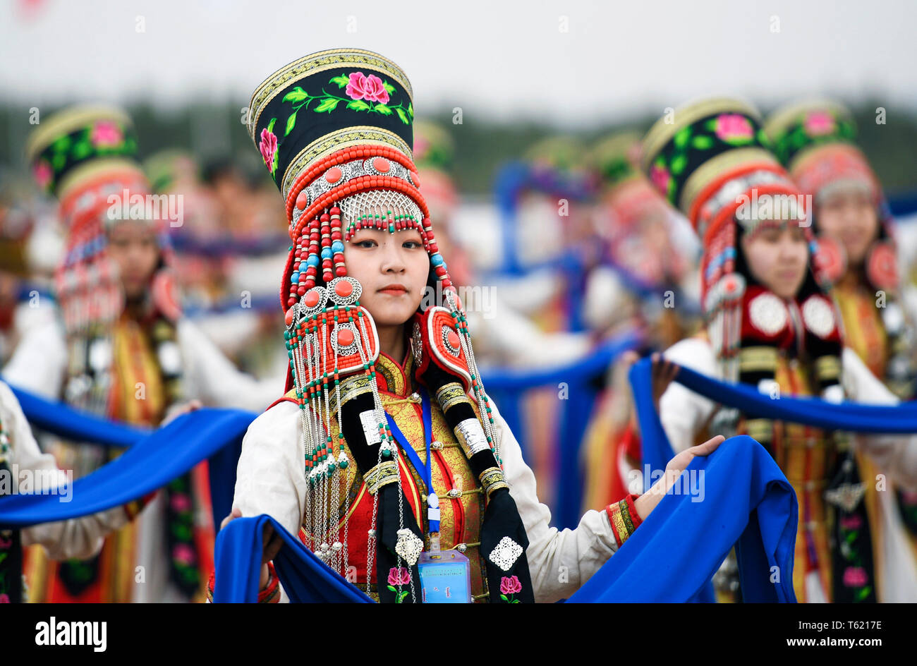 Beijing, China's Inner Mongolia Autonomous Region. 24th Apr, 2019. People dressed in traditional costumes perform at the Genghis Khan Chagan Suluk Nadam Fair in Ejin Horo Banner of Ordos City, north China's Inner Mongolia Autonomous Region, April 24, 2019. Credit: Peng Yuan/Xinhua/Alamy Live News Stock Photo