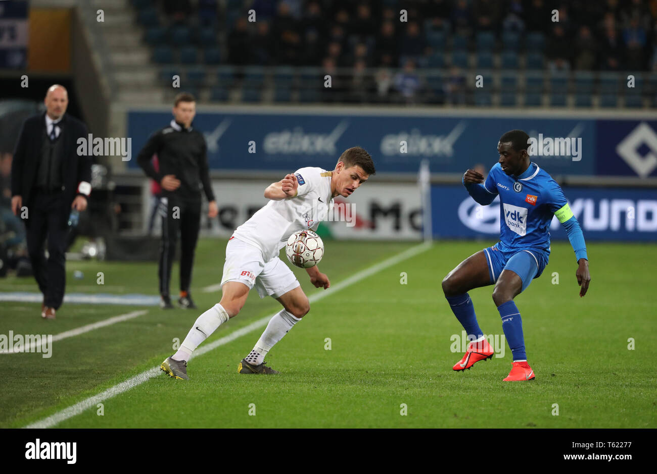 Gent, Belgium. 28th Apr, 2019. GENT, BELGIUM - APRIL 27: Joakim Maehle of Genk and Nana Asare of Kaa Gent fight for the ball during the Jupiler Pro League play-off 1 match (day 6) between Kaa Gent and Krc Genk on April 27, 2019 in Gent, Belgium. (Photo by Vincent Van Doornick/Isosport) Credit: Pro Shots/Alamy Live News Stock Photo