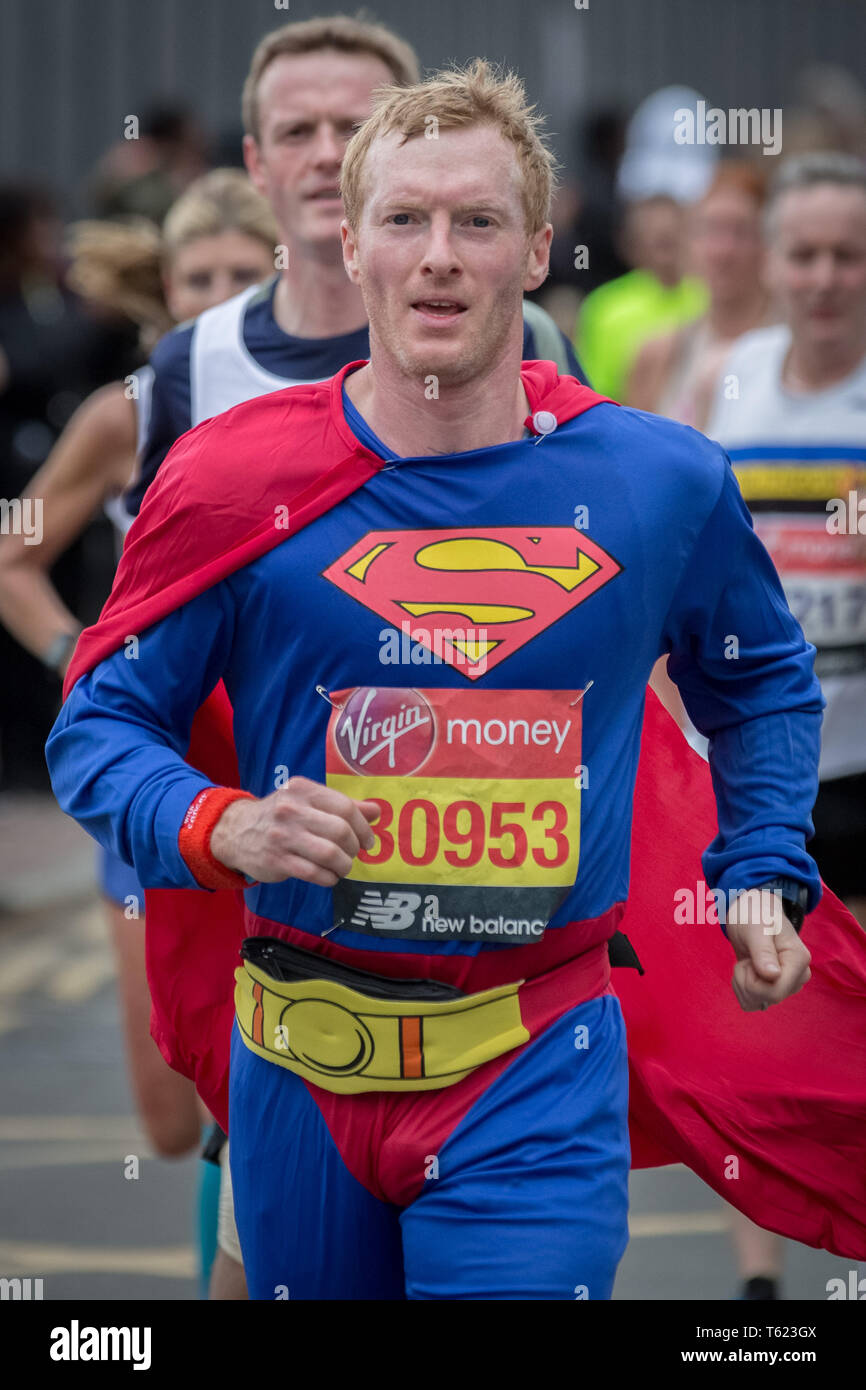 https://c8.alamy.com/comp/T623GX/london-uk-28th-april-2019-39th-london-marathon-passes-through-deptfords-evelyn-street-in-south-east-london-also-the-8-mile-mark-of-the-262-mile-course-where-runners-are-greeted-and-cheered-on-by-local-residents-credit-guy-corbishleyalamy-live-news-T623GX.jpg
