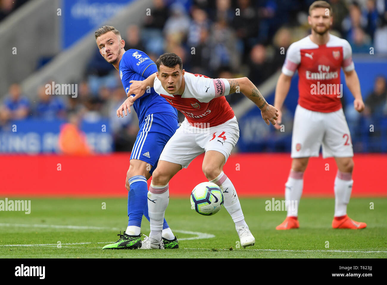 Leicester, UK. 28th April 2019. Granit Xhaka (34) of Arsenal battles with Leicester, UK. 28th April 2019. Leicester City midfielder James Maddison (10) during the Premier League match between Leicester, UK. 28th April 2019. Leicester City and Arsenal at the King Power Stadium, Leicester on Sunday 28th April 2019.   Editorial use only, license required for commercial use. No use in betting, games or a single club/league/player publications. Photograph may only be used for newspaper and/or magazine editorial purposes. Credit: MI News & Sport /Alamy Live News Stock Photo