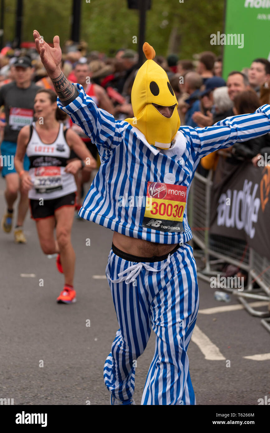 Andy Massingale in Bananas in pyjamas costume running in the London  Marathon 2019. 30030 Stock Photo - Alamy