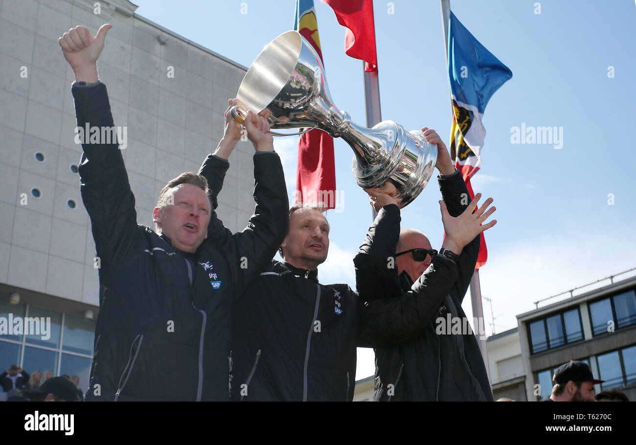 Mannheim, Germany. 28th Apr, 2019. Ice hockey, German Ice Hockey League  (DEL), reception of the German Champion Adler Mannheim at Paradeplatz. The  coach trio with Mike Pellegrims (l-r), Pavel Gross and Pertti