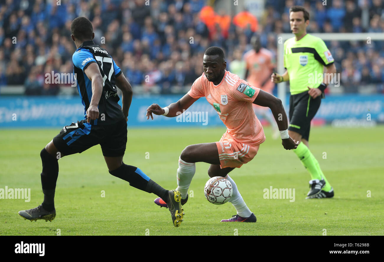 Bruges, Belgium. 28th Apr, 2019. Clinton Mata of Club Brugge and Yannick  Bolasie of Anderlecht fight for the ball during the Jupiler Pro League  play-off 1 match (day 6) between Club Brugge