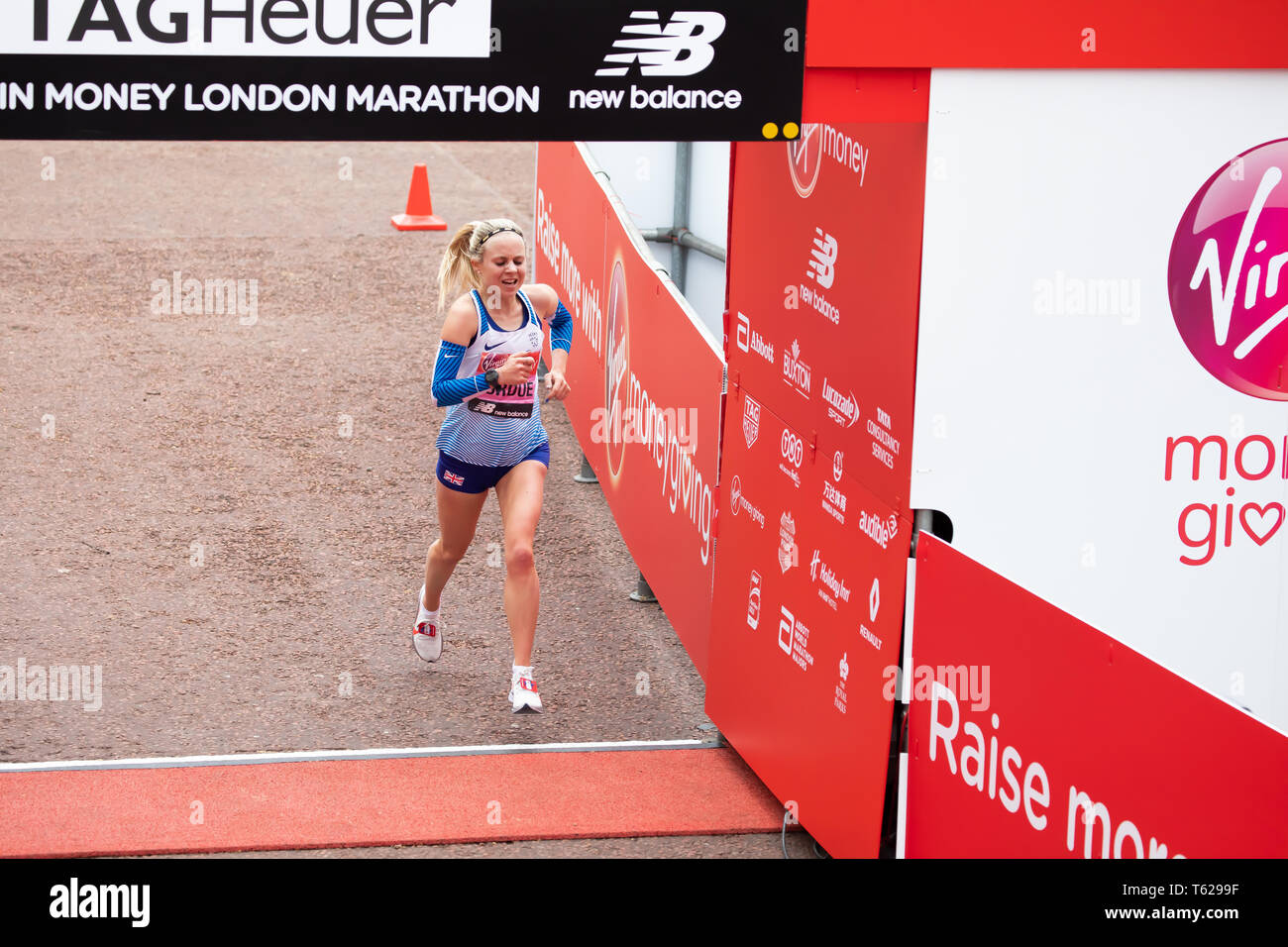 London, UK. 28th April 2019. Charlotte Purdue finishes The 39th London Marathon.Credit: Keith Larby/Alamy Live News Stock Photo