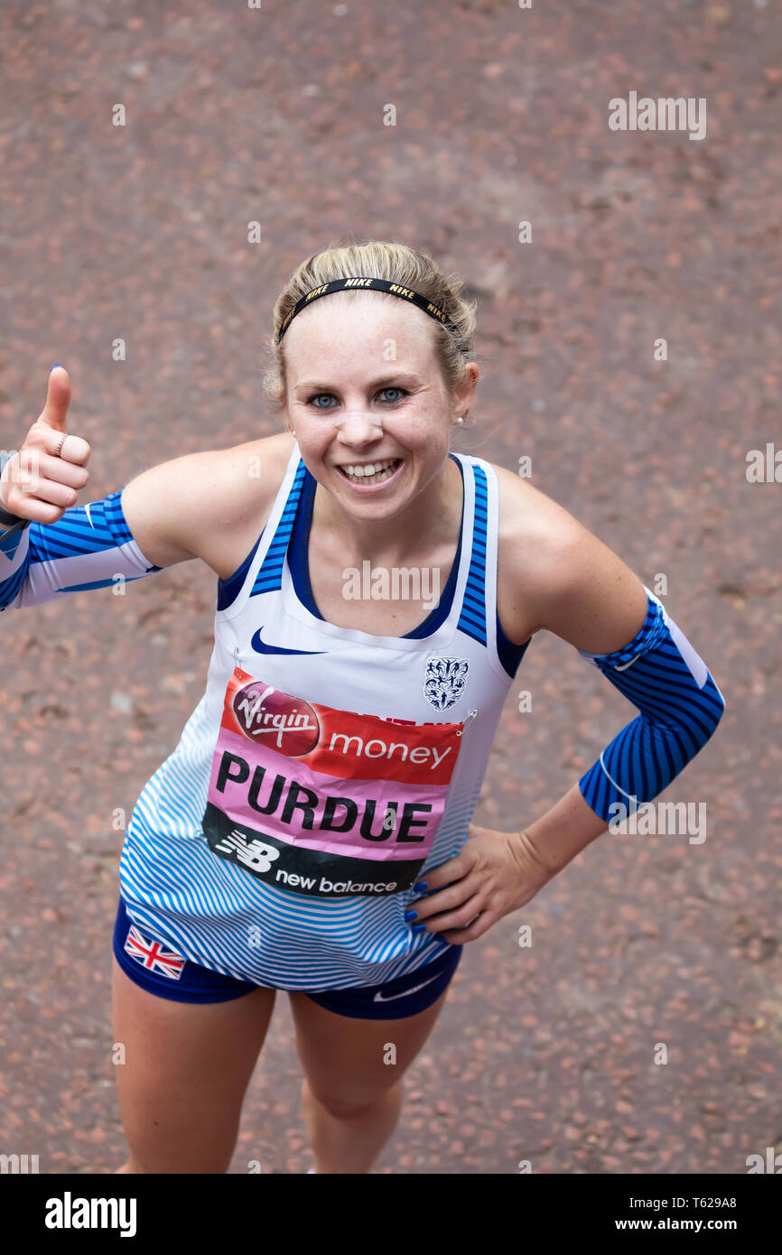 London, UK. 28th April 2019. Charlotte Purdue finishes The 39th London Marathon.Credit: Keith Larby/Alamy Live News Stock Photo