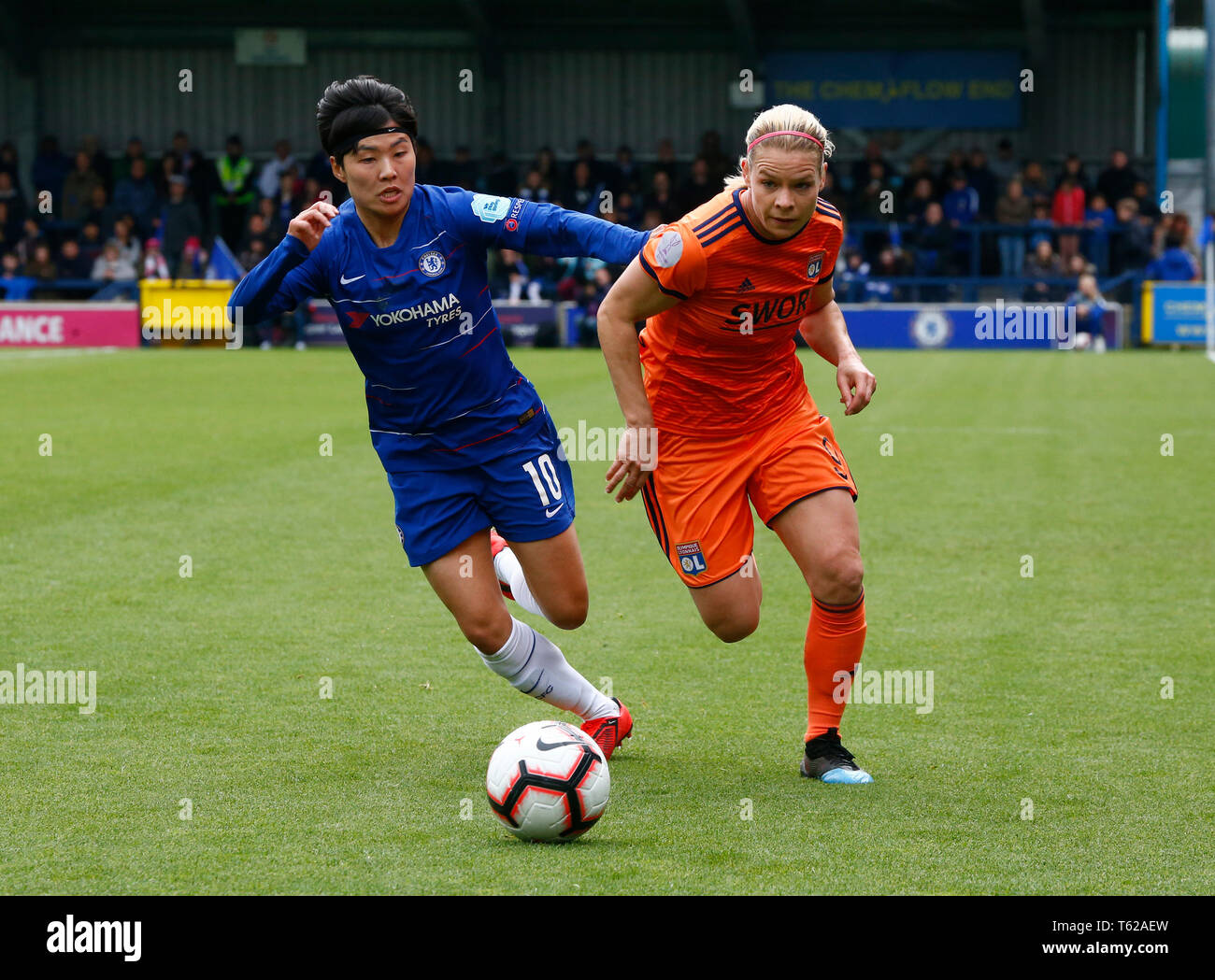 London, UK. 28th Apr, 2019.  L-R Chelsea Ladies Ji So Yun and Eugenie Le Sommer of Olympique Lyonnais Feminies during Women's Champions League Semi-Final 2nd Leg  between Chelsea FC Women and Lyon FŽminines at The Cherry Red Records stadium , Kingsmeadow, England on 28 Apr 2019. Credit Action Foto Sport Credit: Action Foto Sport/Alamy Live News Stock Photo