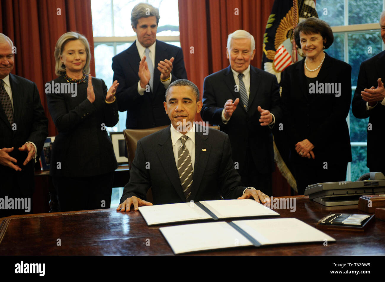 ***FILE PHOTO*** Former Senator Richard Lugar Has Passed Away. United States President Barack Obama signs the New START Treaty during a ceremony in the Oval Office of the White House, with, from left, U.S. Secretary of Defense Robert Gates, U.S. Secretary of State Hillary Rodham Clinton, U.S. Senator John Kerry (Democrat of Massachusetts), U.S. Senator Richard Lugar (Republican of Indiana), U.S. Senator Dianne Feinstein (Democrat of California). Credit: Leslie E. Kossoff/Pool via CNP /MediaPunch Stock Photo