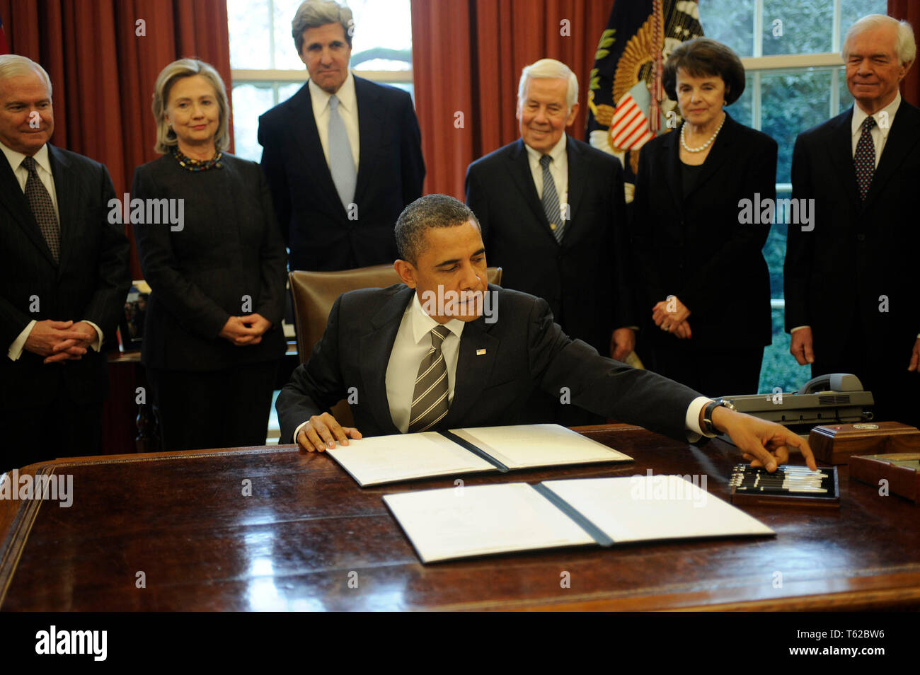 ***FILE PHOTO*** Former Senator Richard Lugar Has Passed Away. United States President Barack Obama signs the New START Treaty during a ceremony in the Oval Office of the White House, with, from left, U.S. Secretary of Defense Robert Gates, U.S. Secretary of State Hillary Rodham Clinton, U.S. Senator John Kerry (Democrat of Massachusetts), U.S. Senator Richard Lugar (Republican of Indiana), U.S. Senator Dianne Feinstein (Democrat of California), U.S. Senator Thad Cochran (Republican of Mississippi. Credit: Leslie E. Kossoff/Pool via CNP /MediaPunch Stock Photo