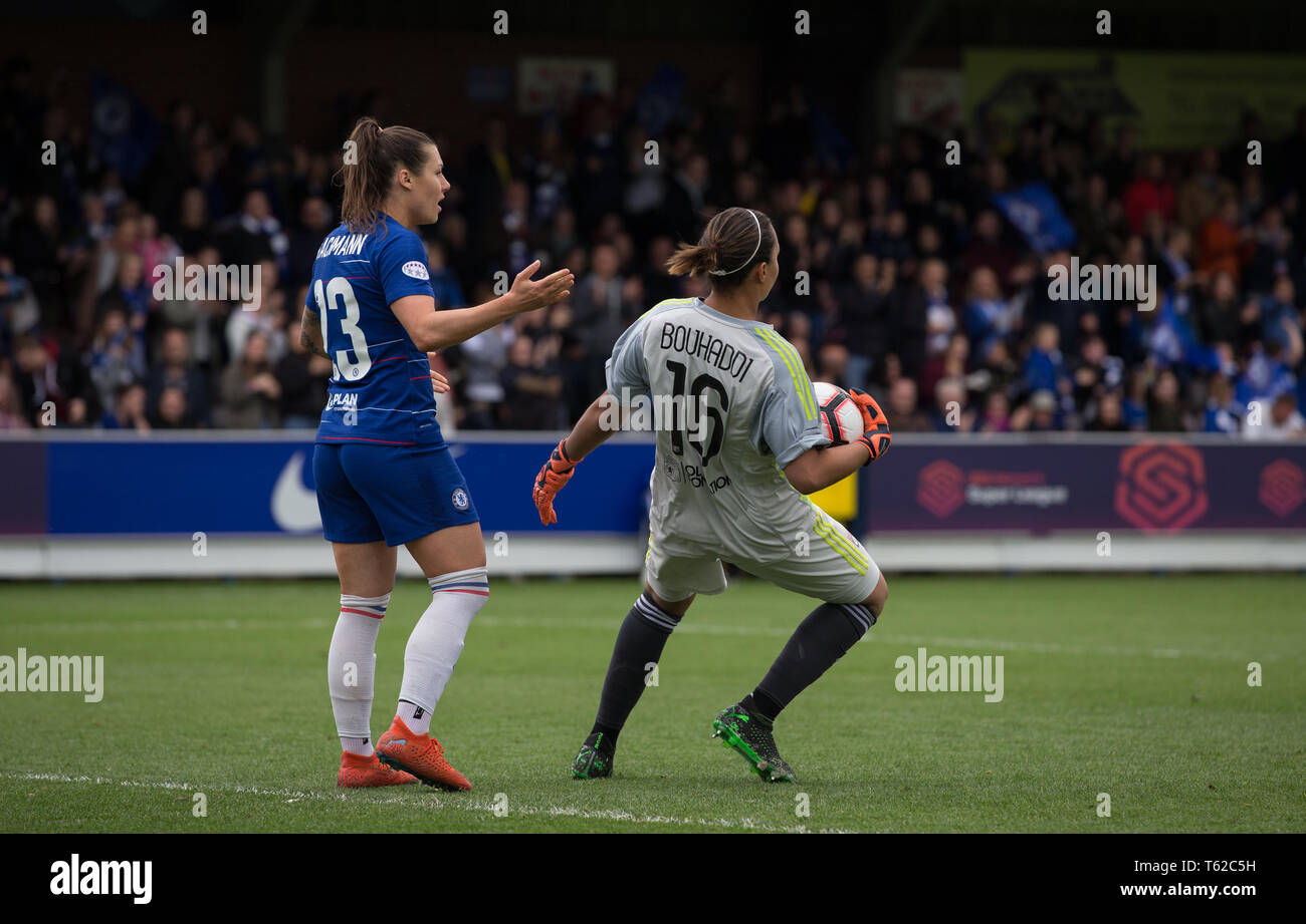 Kingston, UK. 28th Apr, 2019. Goalkeeper Sarah Bouhaddi of Olympique Lyonnais Feminin (FC Lyon) drops down in the penalty area after a tussle over the match ball with Ramona Bachmann of Chelsea Women following Chelsea goal during the UEFA Women's Champions League semi-final 2nd leg match between Chelsea Women and Olympique Lyonnais Feminin at the Cherry Red Records Stadium, Kingston, England on 28 April 2019. Photo by Andy Rowland. Credit: PRiME Media Images/Alamy Live News Stock Photo