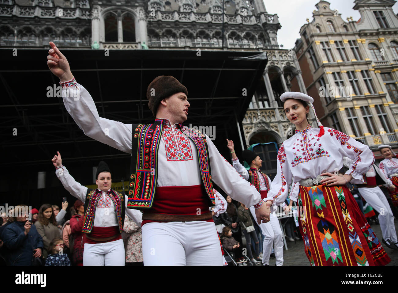 Brussels, Belgium. 28th Apr, 2019. Dancers perform the Bulgarian folk dance on the last day of the 2019 Balkan Trafik at the Grand Place in Brussels, Belgium, April 28, 2019. The festival aims to share the artistic and festive cultures of the Balkans in south-eastern Europe. Credit: Zheng Huansong/Xinhua/Alamy Live News Stock Photo