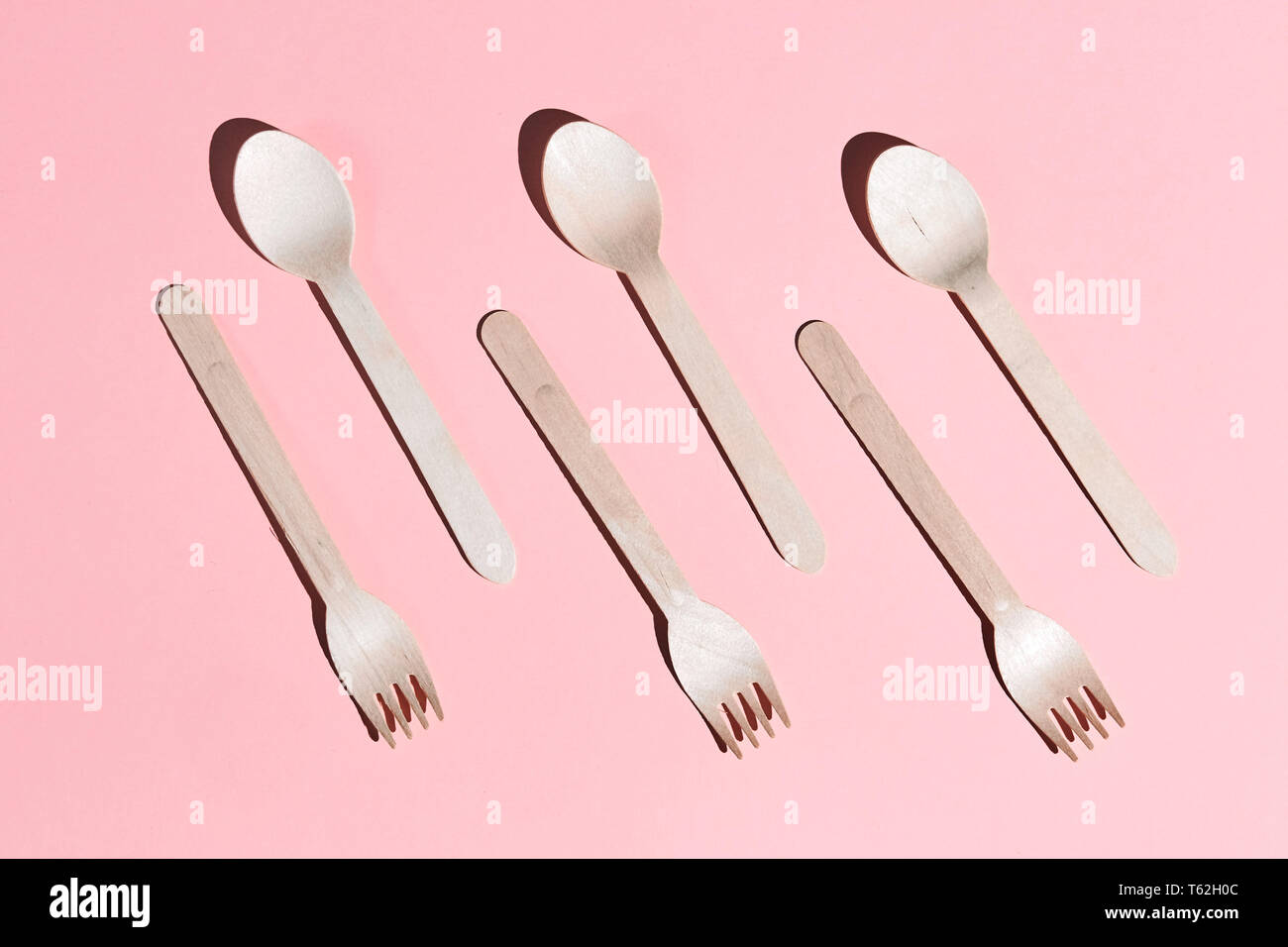 disposable plastic forks, spoons for cafe visitors, top view photo. Stock Photo
